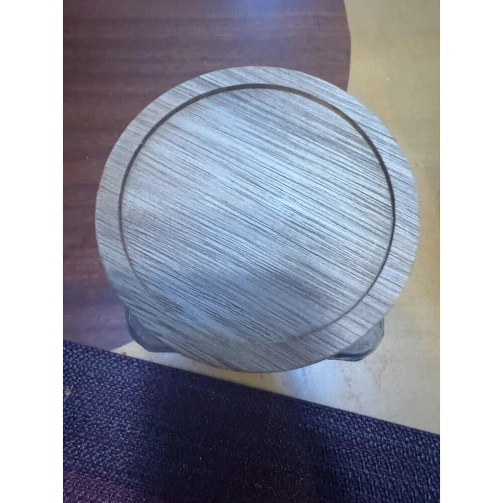 Embossed glass storage jar